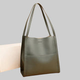 ÜHEVÄRVI NEUTRAALNE KÄEKOTT ÕLALE TÕELISEST NAHAST