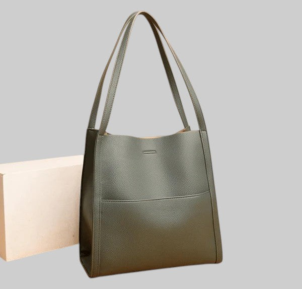 ÜHEVÄRVI NEUTRAALNE KÄEKOTT ÕLALE TÕELISEST NAHAST