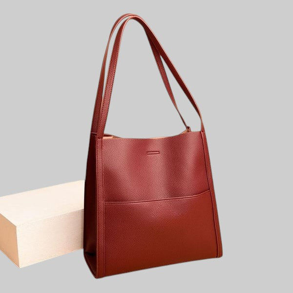 ÜHEVÄRVI NEUTRAALNE KÄEKOTT ÕLALE TÕELISEST NAHAST